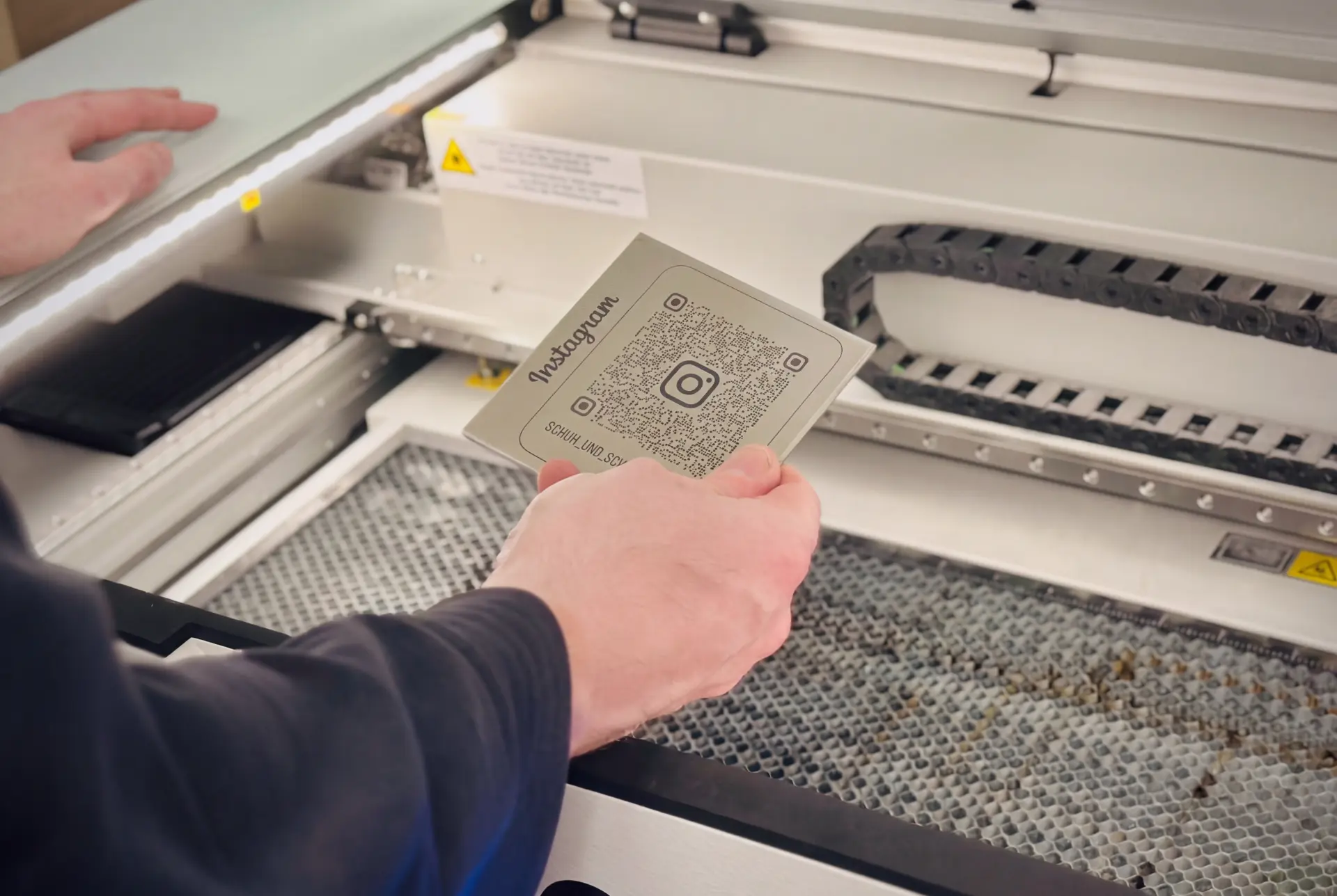 Engraved metal plate with QR code