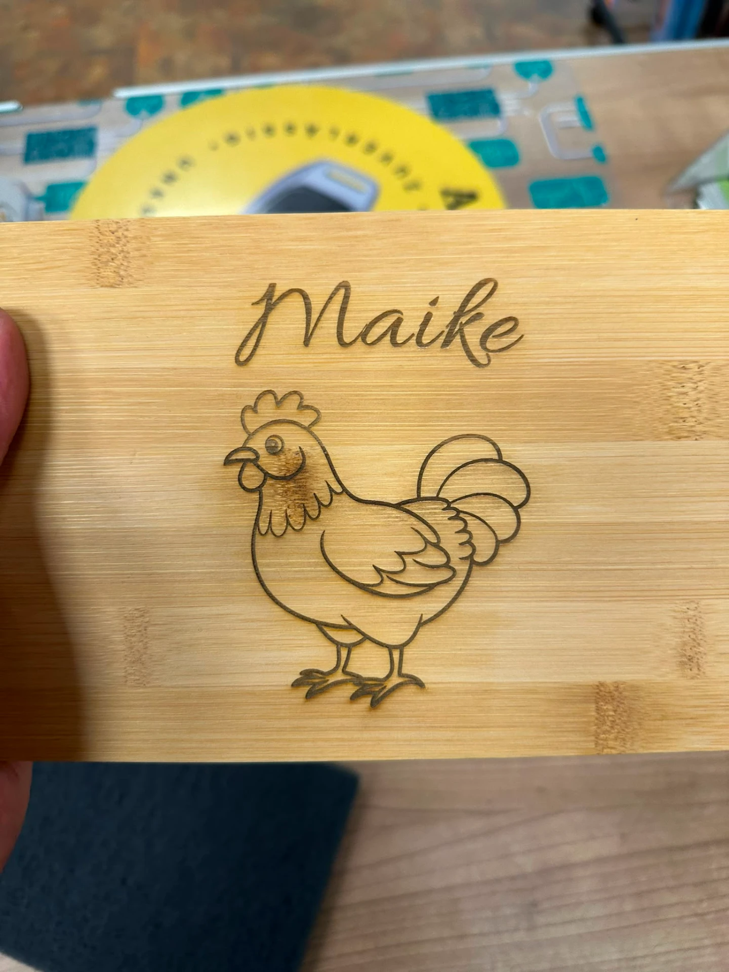 Laser-engraved wooden board with name and motif